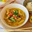 22. mit Thai-Curry-Kokos Soße und Gemüse (scharf, G)