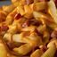 Fritas com cheddar e farofa de bacon