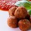 Sfere di cereali con coulis di pomodoro e origano