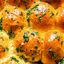 Fluffy Dinner Rolls with Garlic Herb Butter